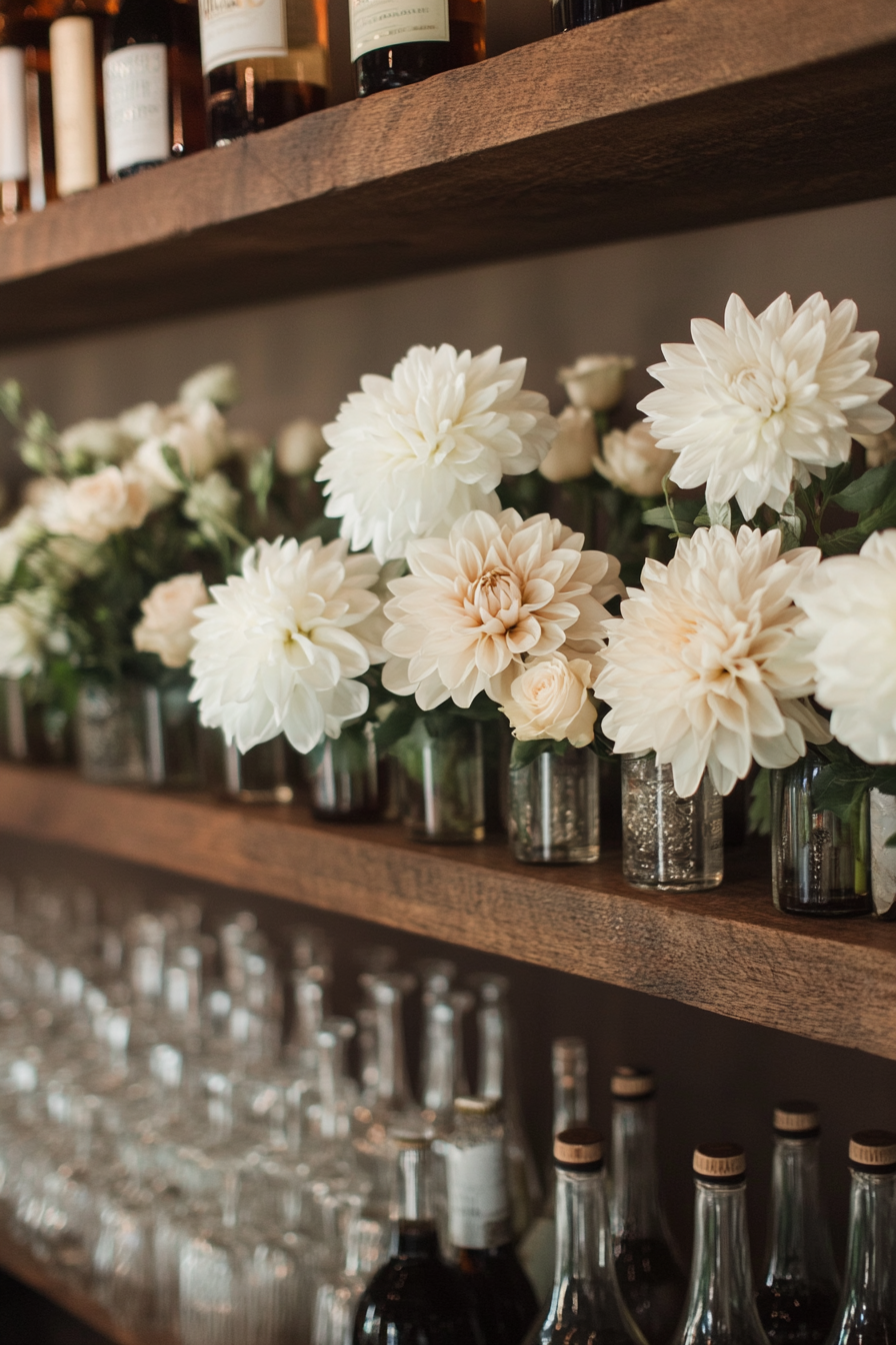 Wedding bar display. Floating shelves with dahlias and white roses.